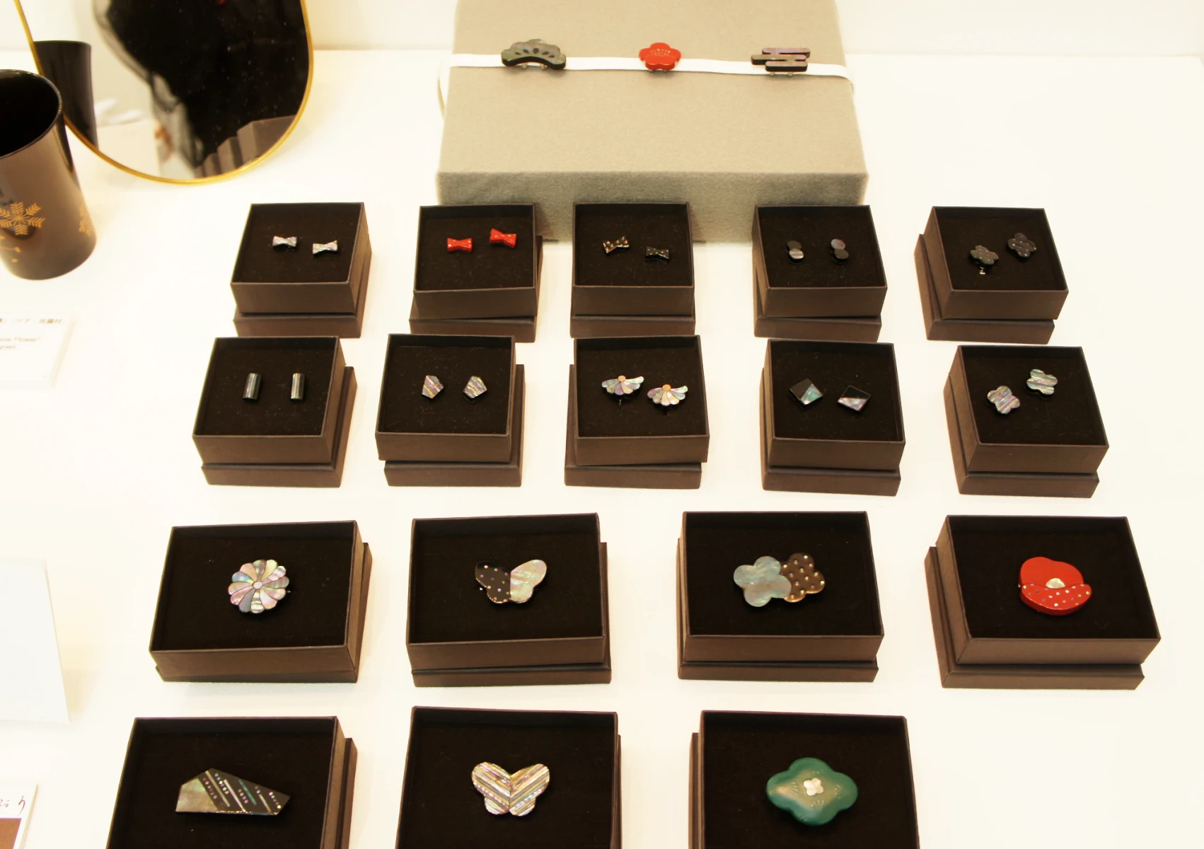 Art Fair Tokyo 2026, Raden brooches, obi-dome (sash clips), and earrings by Kaori Sugano.