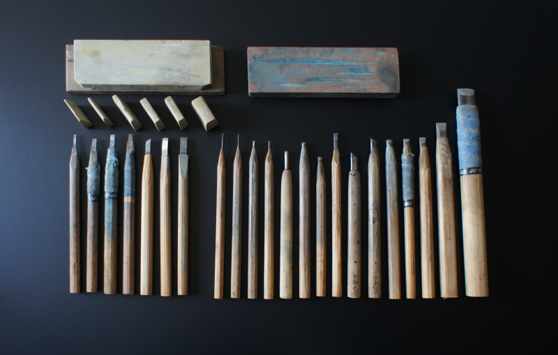 Engraving knives, flattening knives (7 knives on the left), whetstone