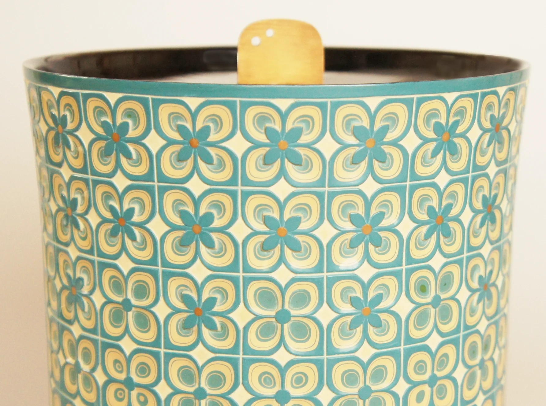 Close-up of the carved lacquer section of the choshitsu (carverd lacquery) Water Container titled Hydrangeas.